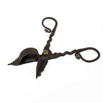 A set of a wrought iron key and wick snuffer, 17th - 18th century.