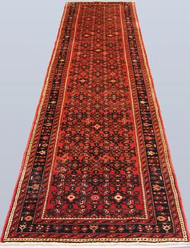 A Hosseinabad runner carpet, 384 x 80 cm.