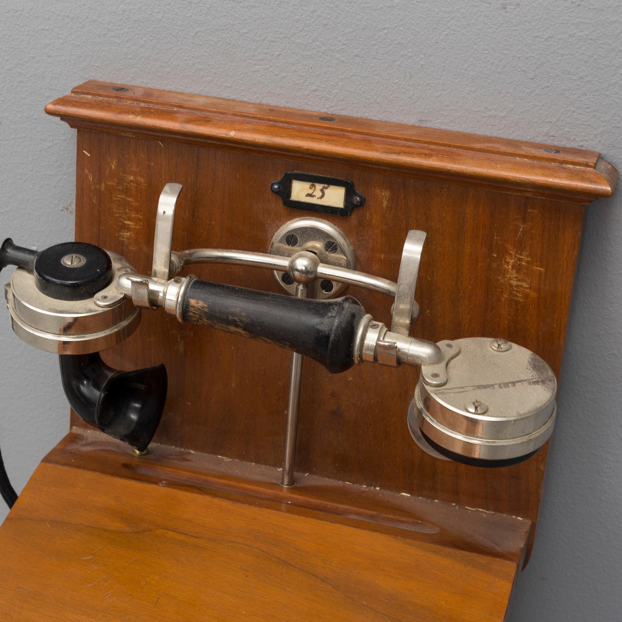 An early wall mounted telephone, L.M. Ericsson, Stockholm, early 20th century.