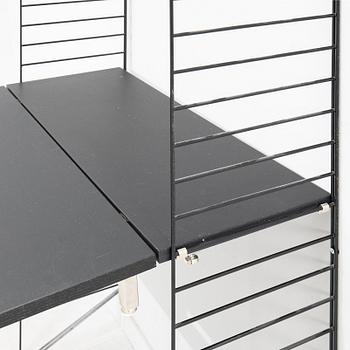 Nils Strinning, Hyllsystem.