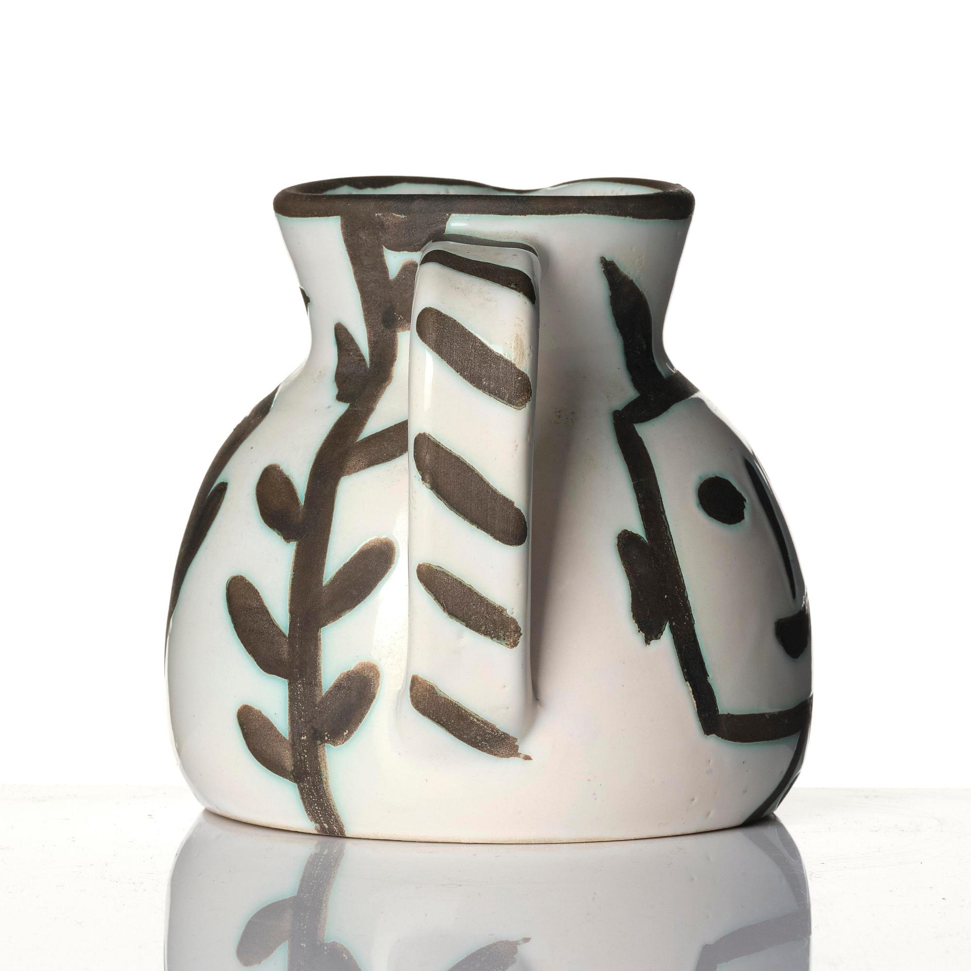 Pablo Picasso, a "Pichet tête carrée" (A.R. 223) faience pitcher, Madoura, Vallauris, France, post 1953.