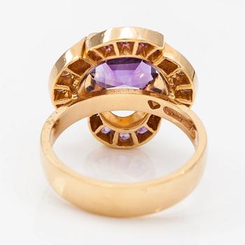 An 18K gold ring "Catherine Jagellion" with amethysts and diamonds ca. 0.37 ct in total. Ofelia Jewelry, Helsinki 1998.