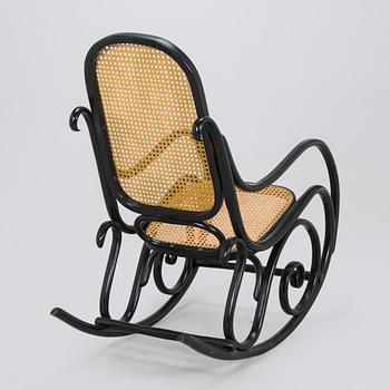 A mid-20th century Thonet style rocking chair.