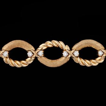 1053. ARMBAND, Tiffany, guld med briljantslipade diamanter, tot. 1.20 ct.