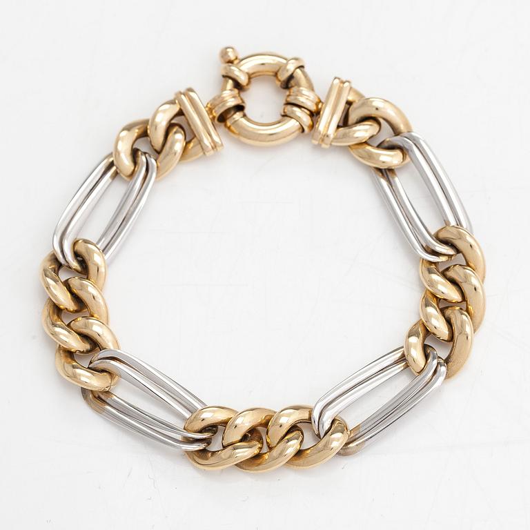 A 14K white and yellow gold bracelet.