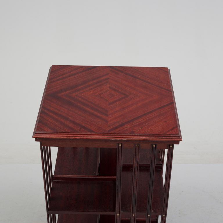 An second half of the 20th century turning book shelf veneered with mahogny.