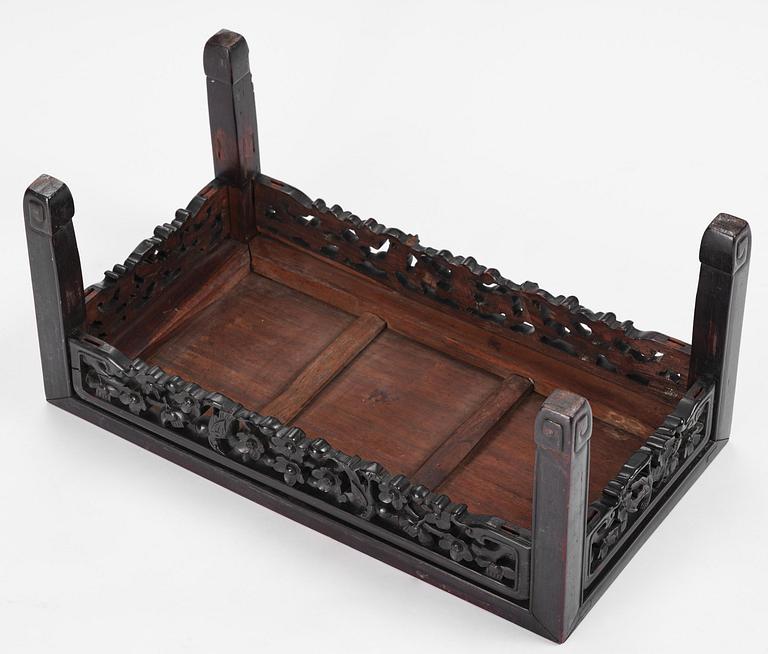A Chinese hardwood kang table, late Qing dynasty.