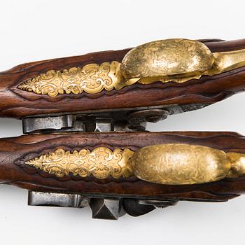 A pair of mid 18th Century German-Austrian flintlock pistols.