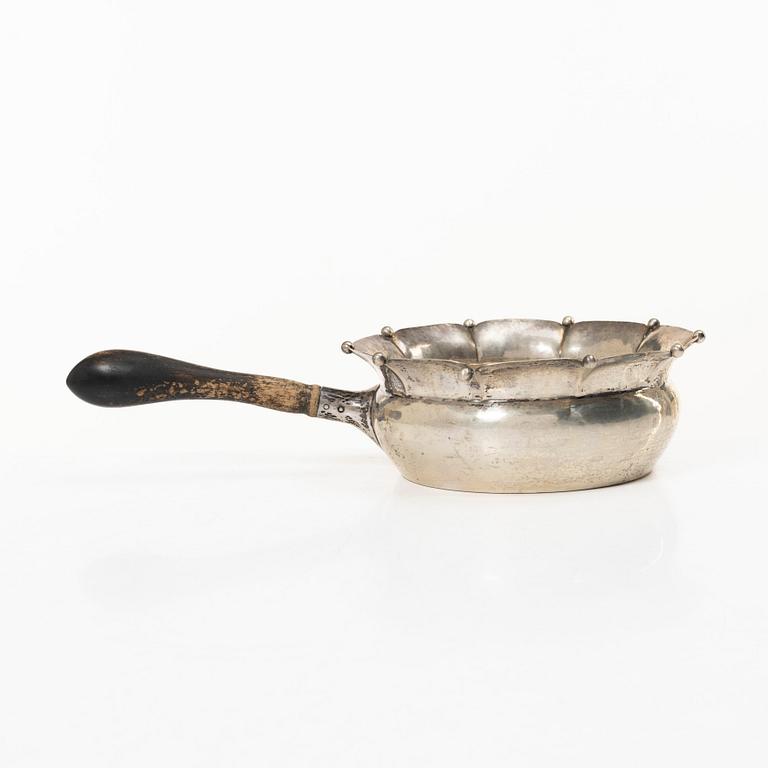 Sauceboat, silver, Oscar Sjögren, Gothenburg 1920, and spoon, silver, David Andersen, Norway early 20th century.