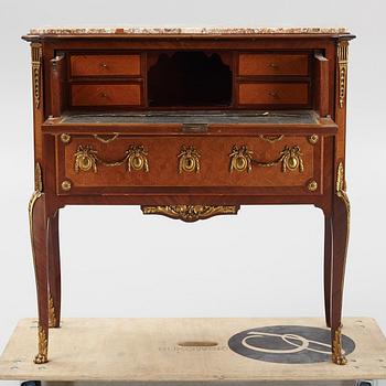A Louis XVI-style bureau from the second half of the 20th century.