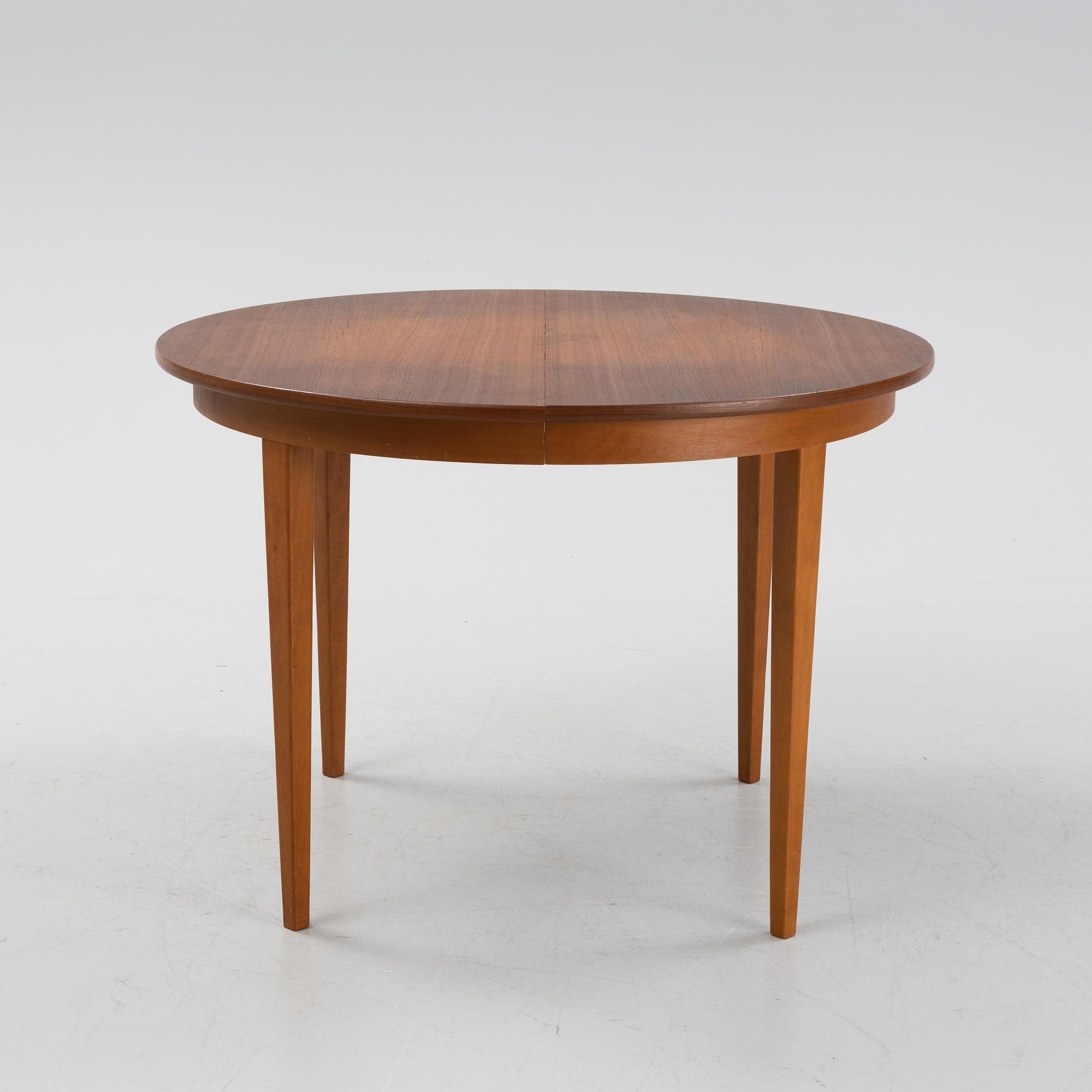 A mid 20th century teak veneer table.