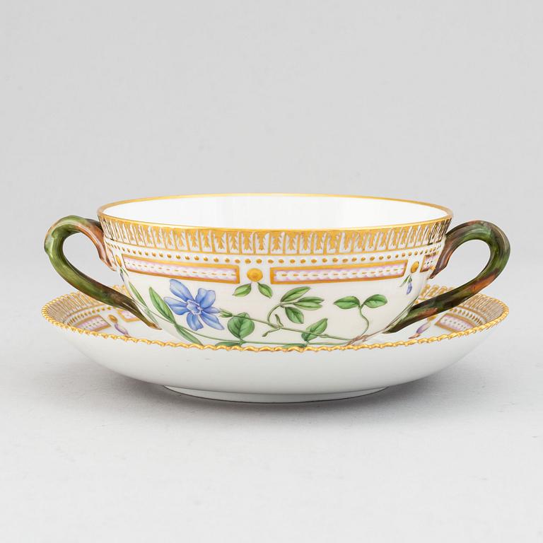 Royal Copenhagen, A 'Flora Danica' porcelain soup cup with saucer.