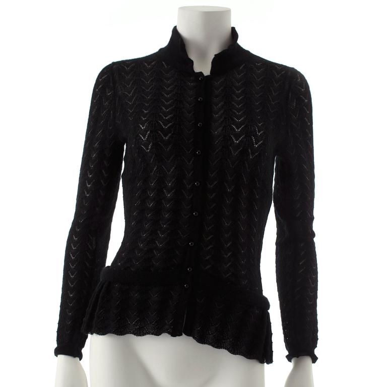 LOUIS VUITTON, a black cashmere cardigan.