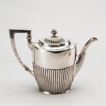 A three piece silver coffee service mark of CG Hallberg Stockholm 1916, weight 896 gram.