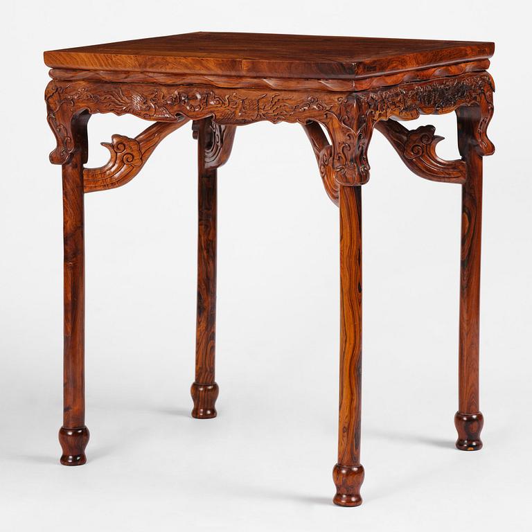 A Chinese huali square table with a lotus-leaf waist, 20th century.