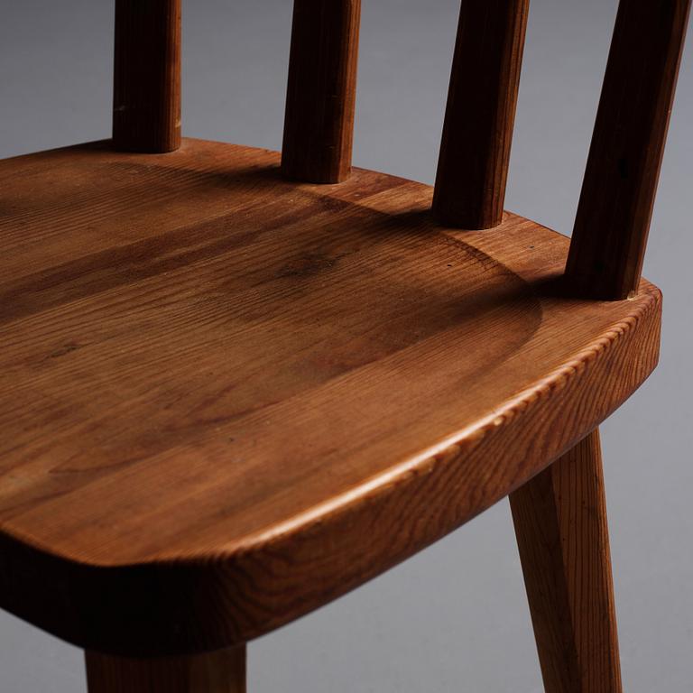 Axel Einar Hjorth, a set of four stained pine "Utö" chairs, Nordiska Kompaniet, Sweden 1930s.