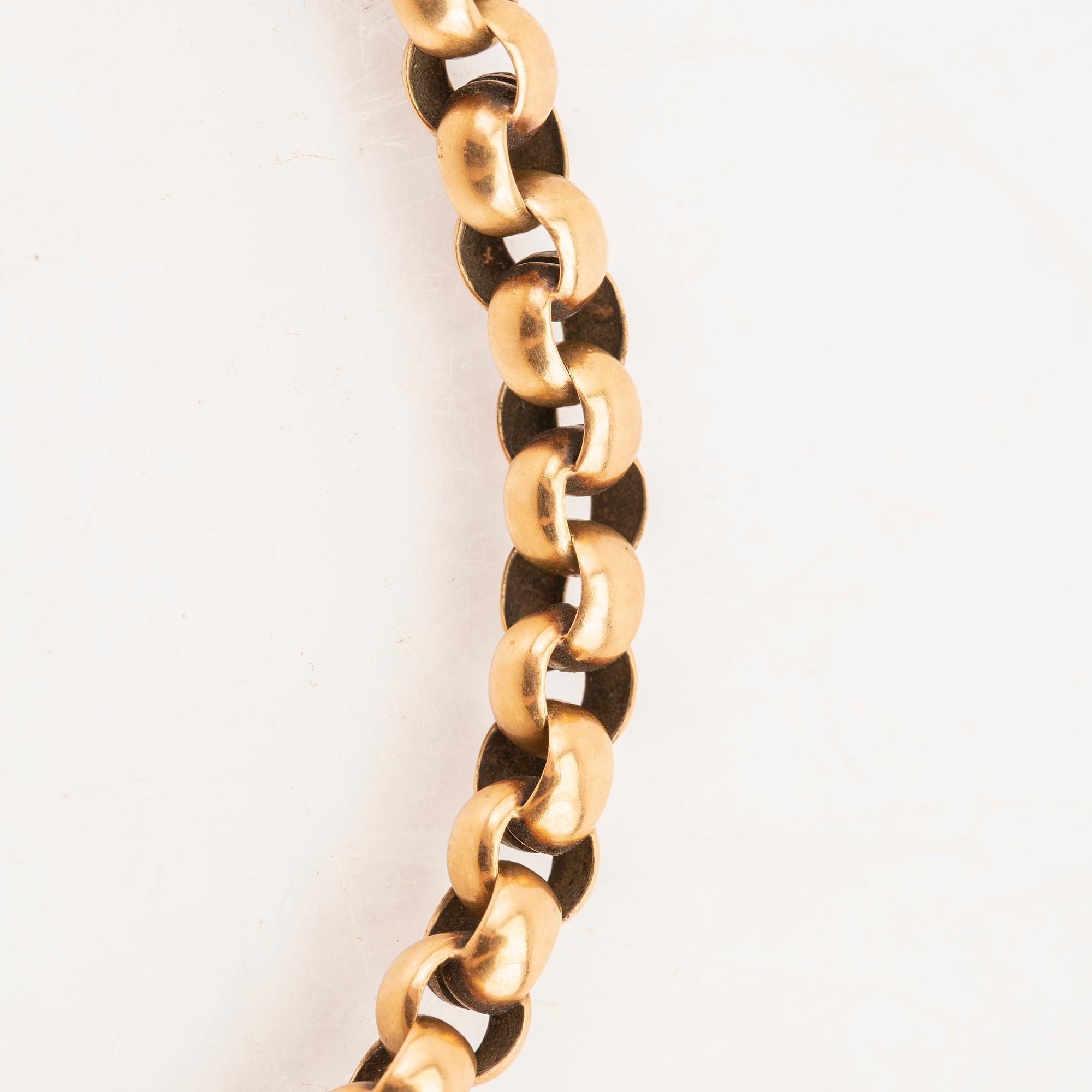 An 18K gold watch chain from year 1900.