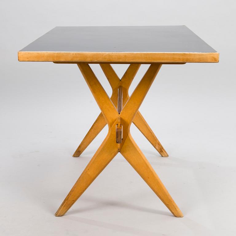 ILMARI TAPIOVAARA, A 1940s X-LEGGED TABLE for Keravan Puuteollisuus, Finland.