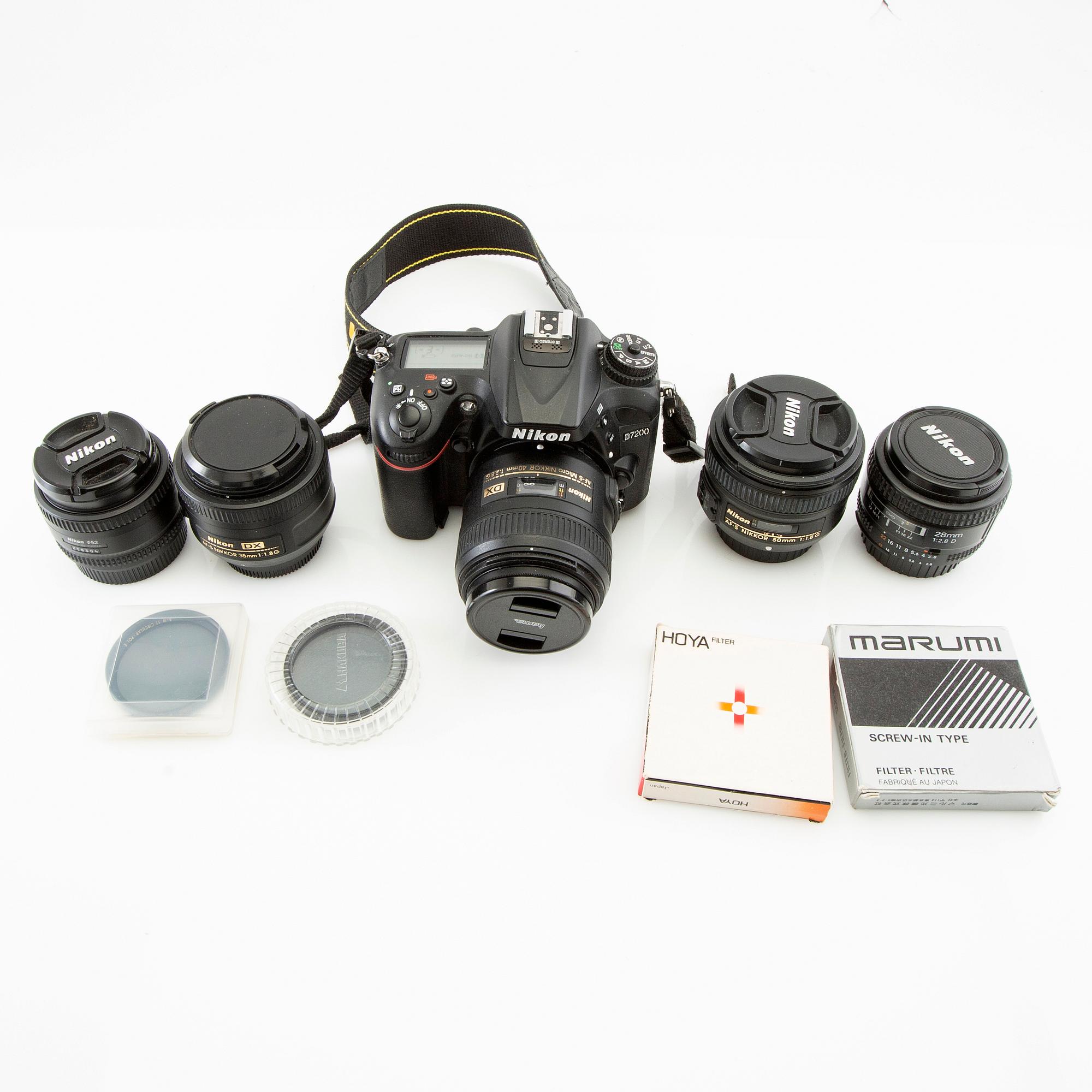 Camera Nikon D7200 along with 5 lenses and a bag.