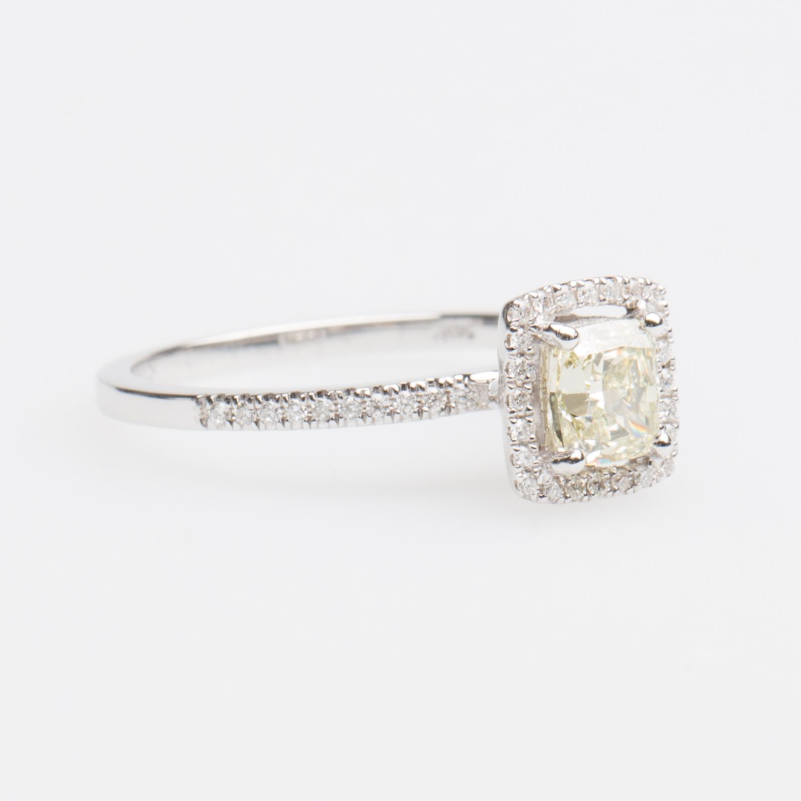 RING, 14K vitguld med fasettslipad gul diamant ca 0.70 ct.