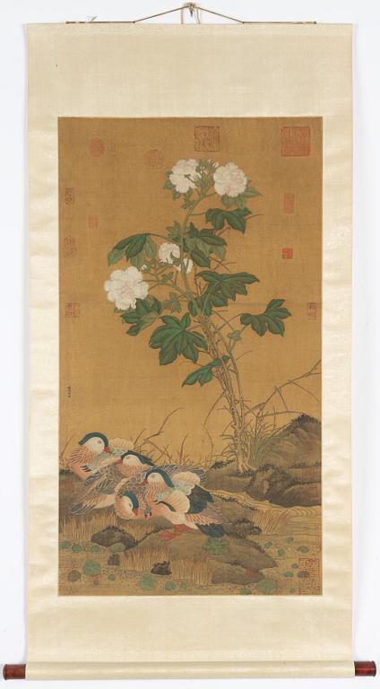 A Chinese scroll painting by unidentified master, four ducks resting by a blooming pond, 20th century.