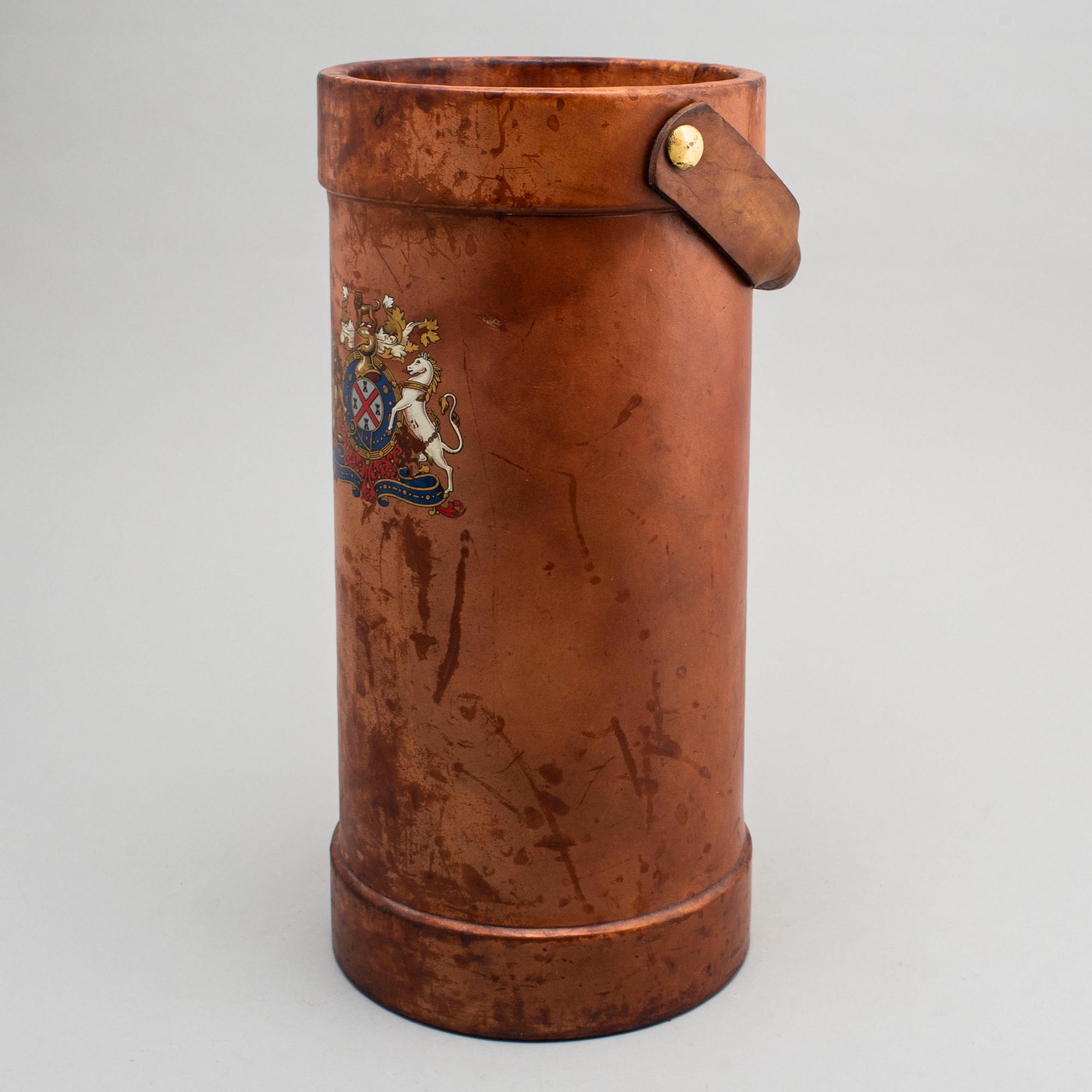 A LEATHER UMBRELLA STAND.