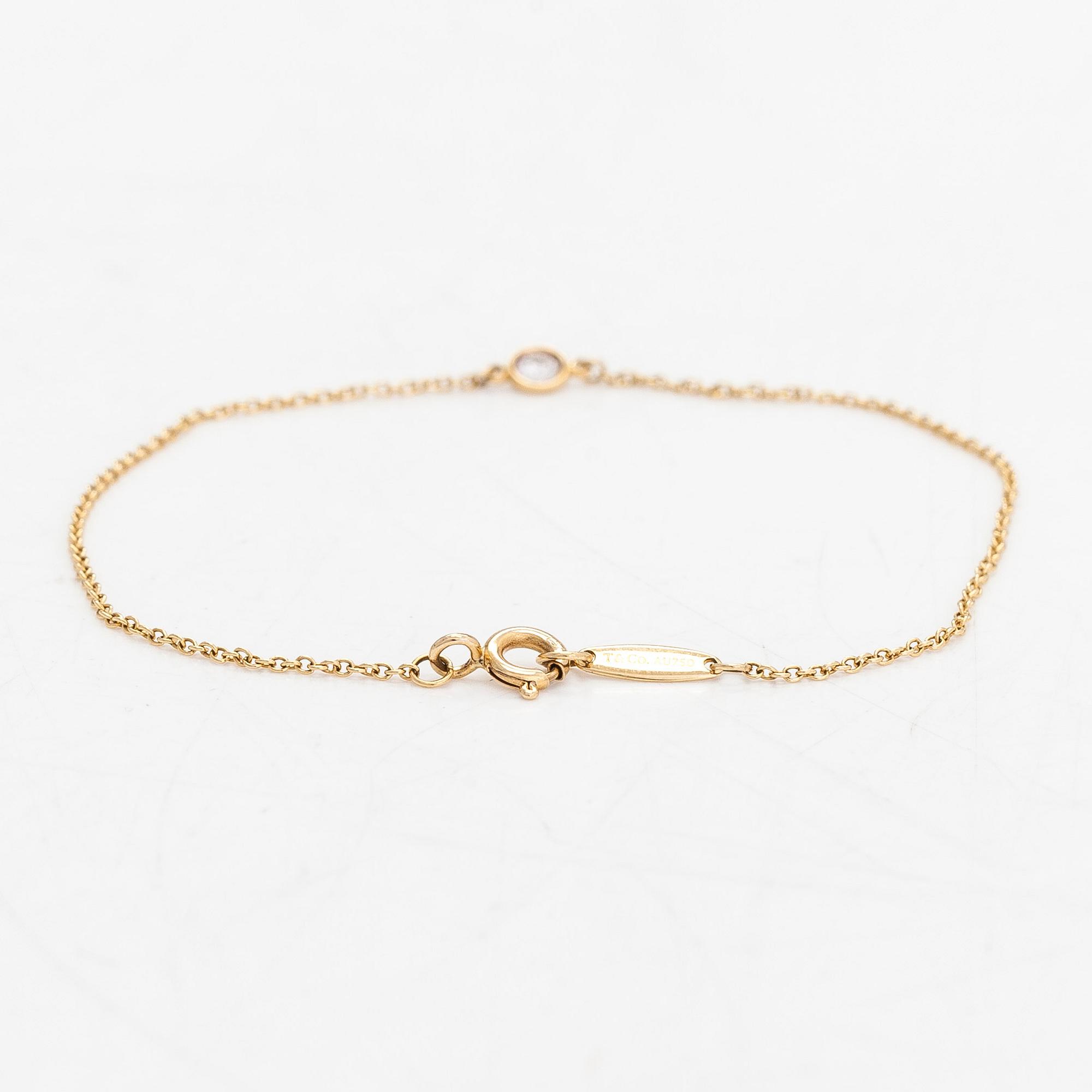 Tiffany & Co, Elsa Peretti, armband, "Diamonds by the Yard", 18K guld med en diamant ca 0.08 ct.