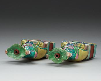 A pair of famille rose censer-stick holders, Qing dynasty, Qianlong (1736-95).