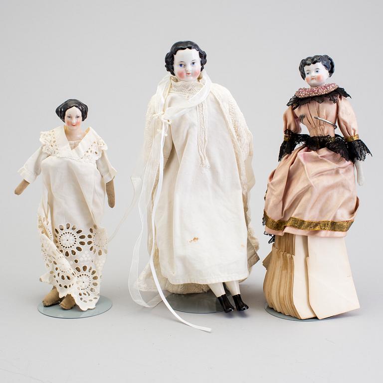 A lot of 12 dolls and doll heads in porcelain Germany early 20th century.