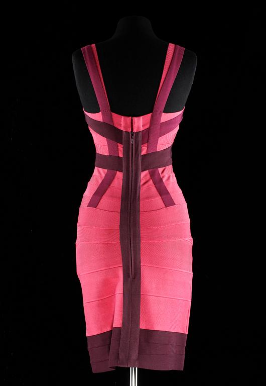 A pink and purple tight, strech dress by Herve Leger.