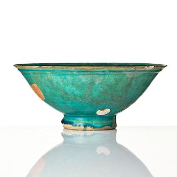 A conic Kashan pottery bowl, central Persia, 11th century.