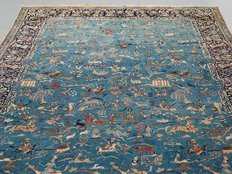 A CARPET, an antique/semi-antique Tabriz part silk figural, ca 345-346 x 217,5-232 cm.