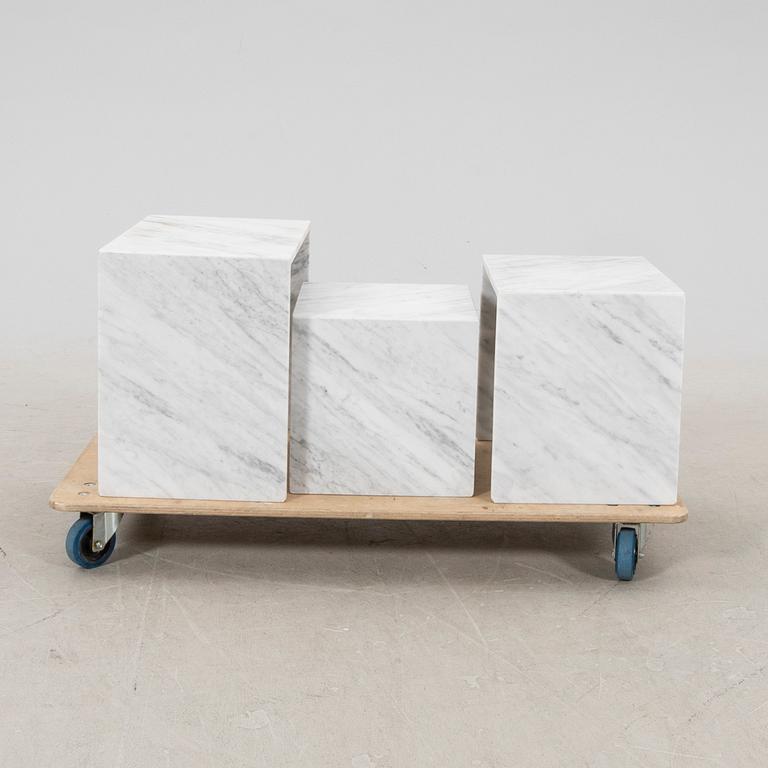 A three piece marble coffee table from the second half of the 20th century.