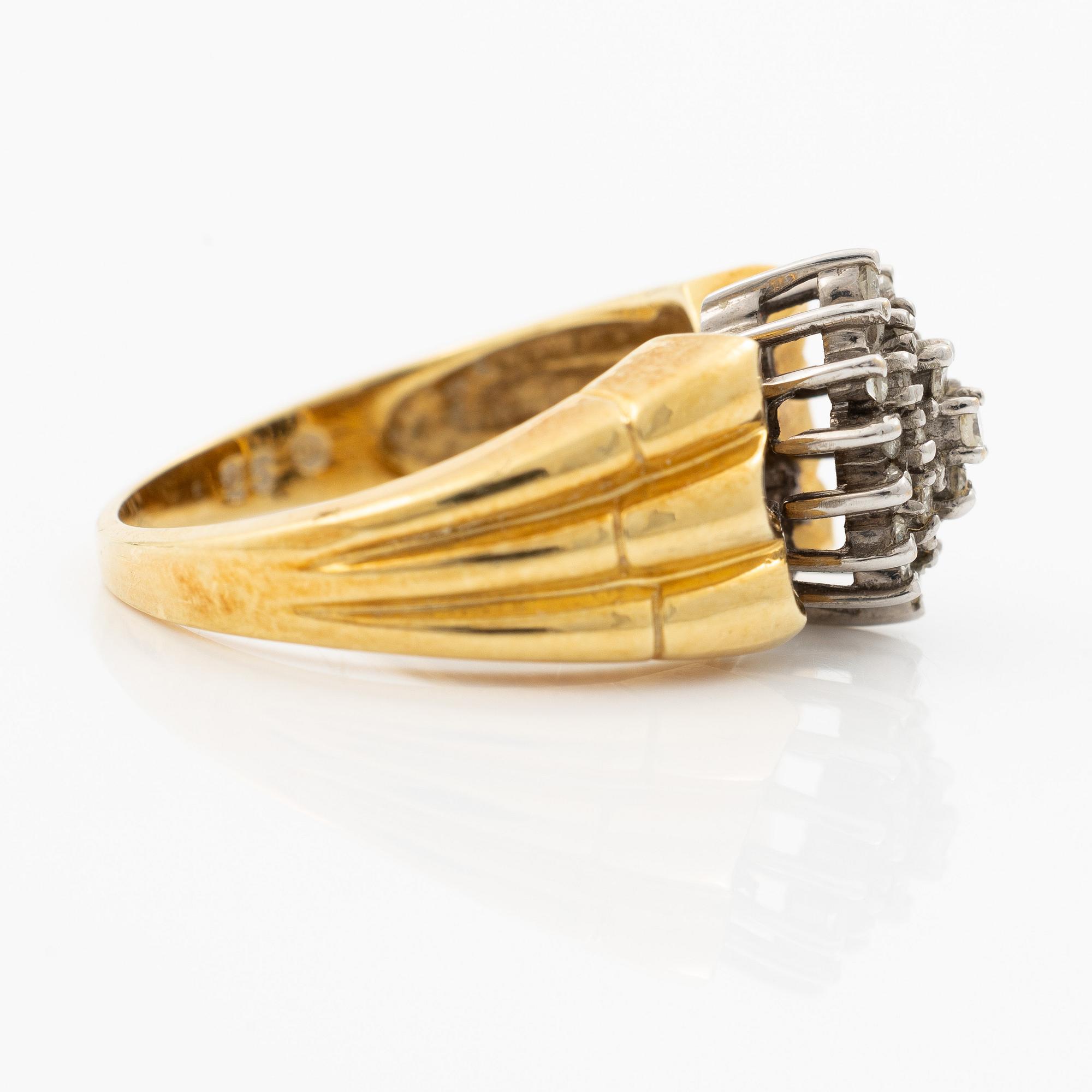 18K gold ring with diamonds.