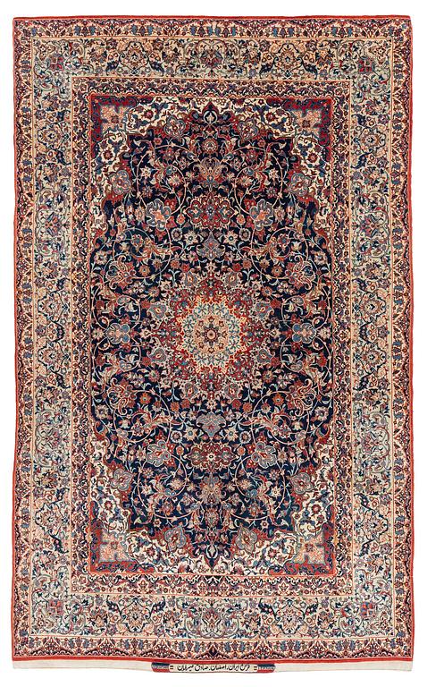 A semi-antique Isfahan rug, signed (Sadegh) Seirafian, c. 244 x 149 cm.