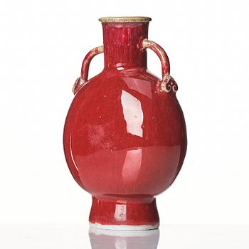 A sang de boef glazed moon flask, Qing dynasty, circa 1900.