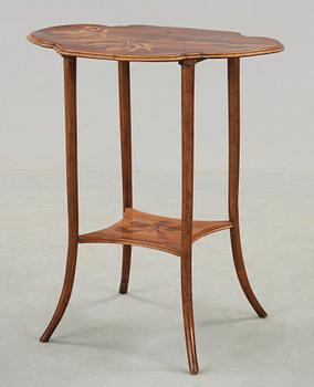 An Emile Gallé Art Nouveau mahogany table with floral inlays, Nancy, France ca 1900.