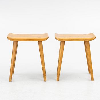 Carl Malmsten, a pair of "Visingsö" stools, Svensk Fur, second half of the 20th century.