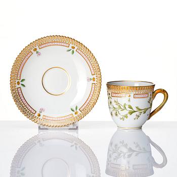 A set of 3 Royal Copenhagen 'Flora Danica' coffee cups with stands and 5 small dishes, Denmark, 20th Century.
