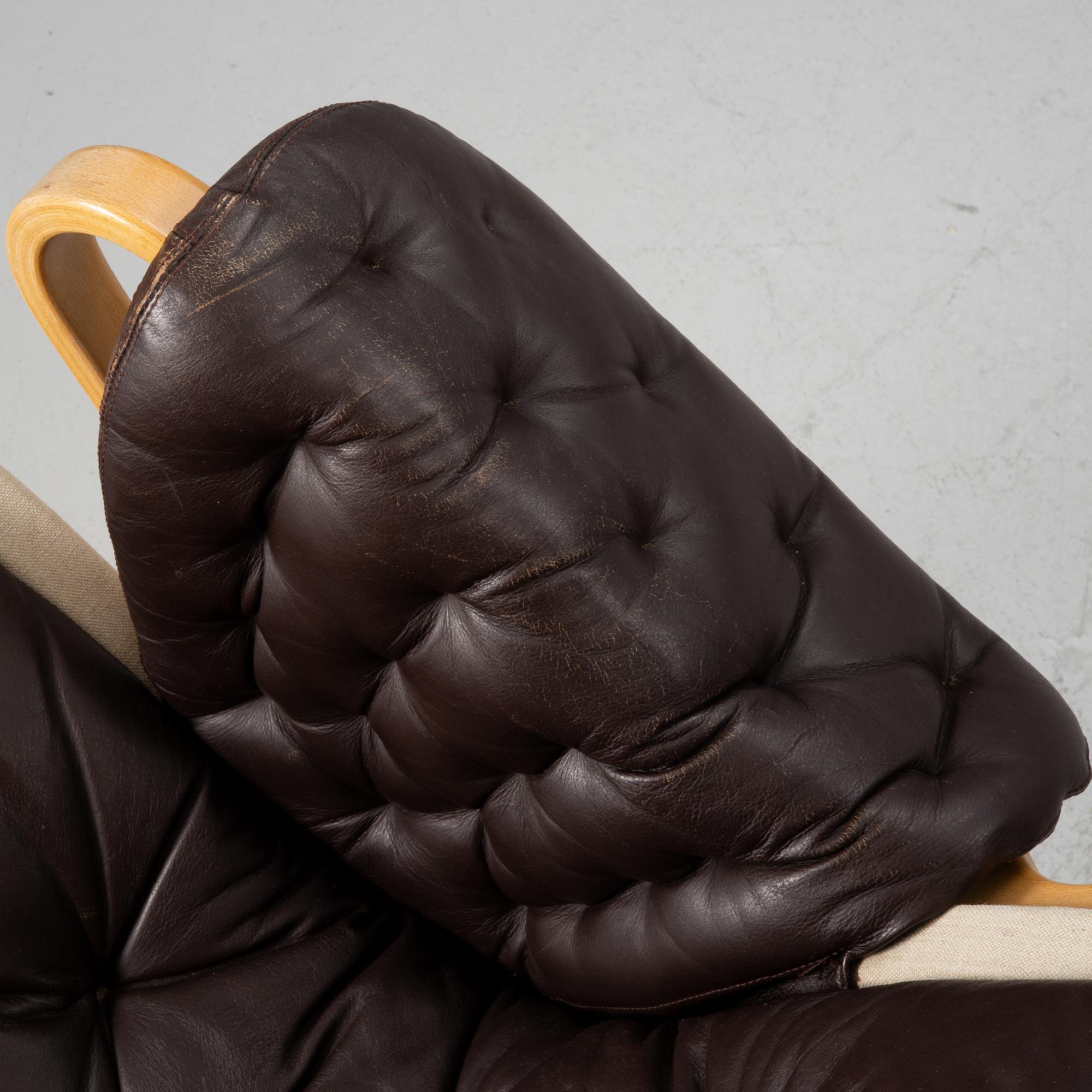 Bruno Mathsson, a 'Pernilla' armchair with ottoman, Dux.