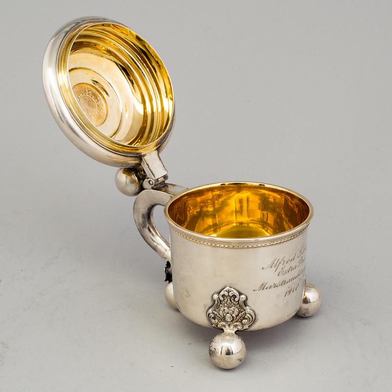A 20th century parcel-gilt miniature tankard, mark of B Hertz AB, Stockholm 1910.