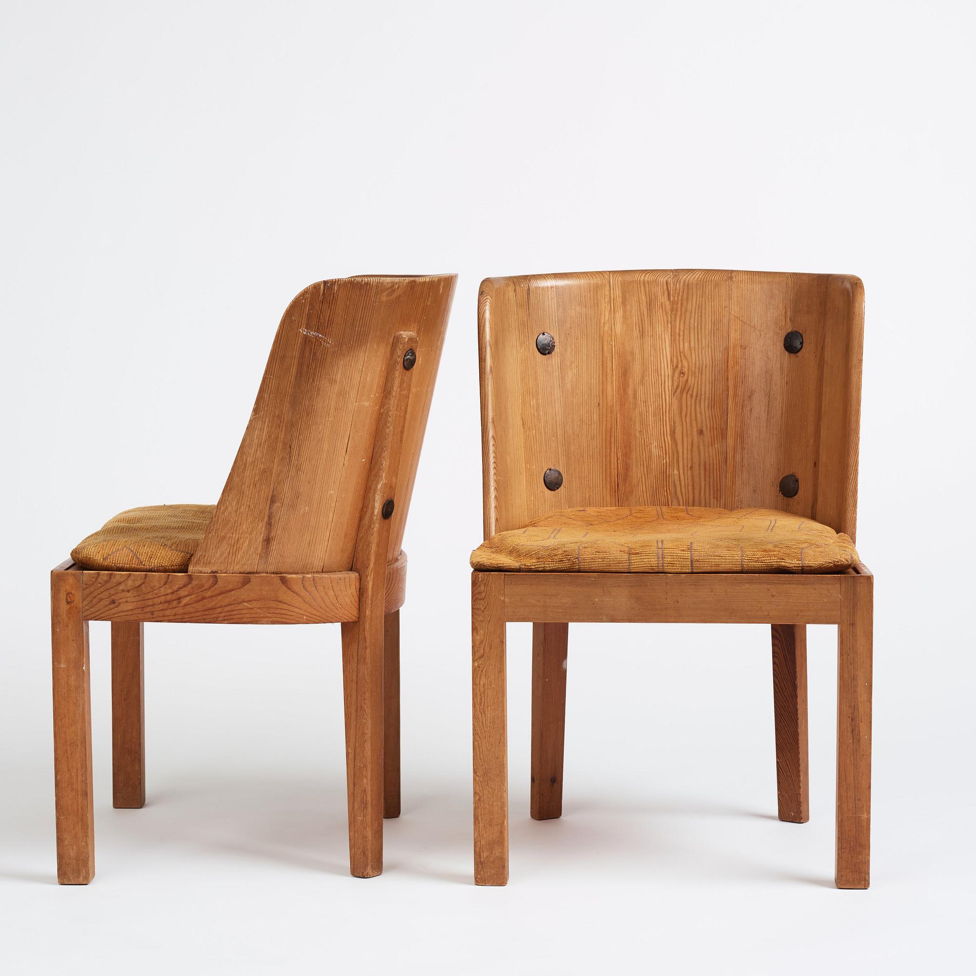 Axel Einar Hjorth, a pair of stained pine 'Lovö' chairs, Nordiska Kompaniet, Sweden 1930s.