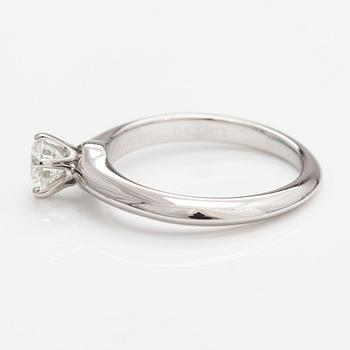 Tiffany & Co, A platinum ring with a ca. 0.55 ct diamond.