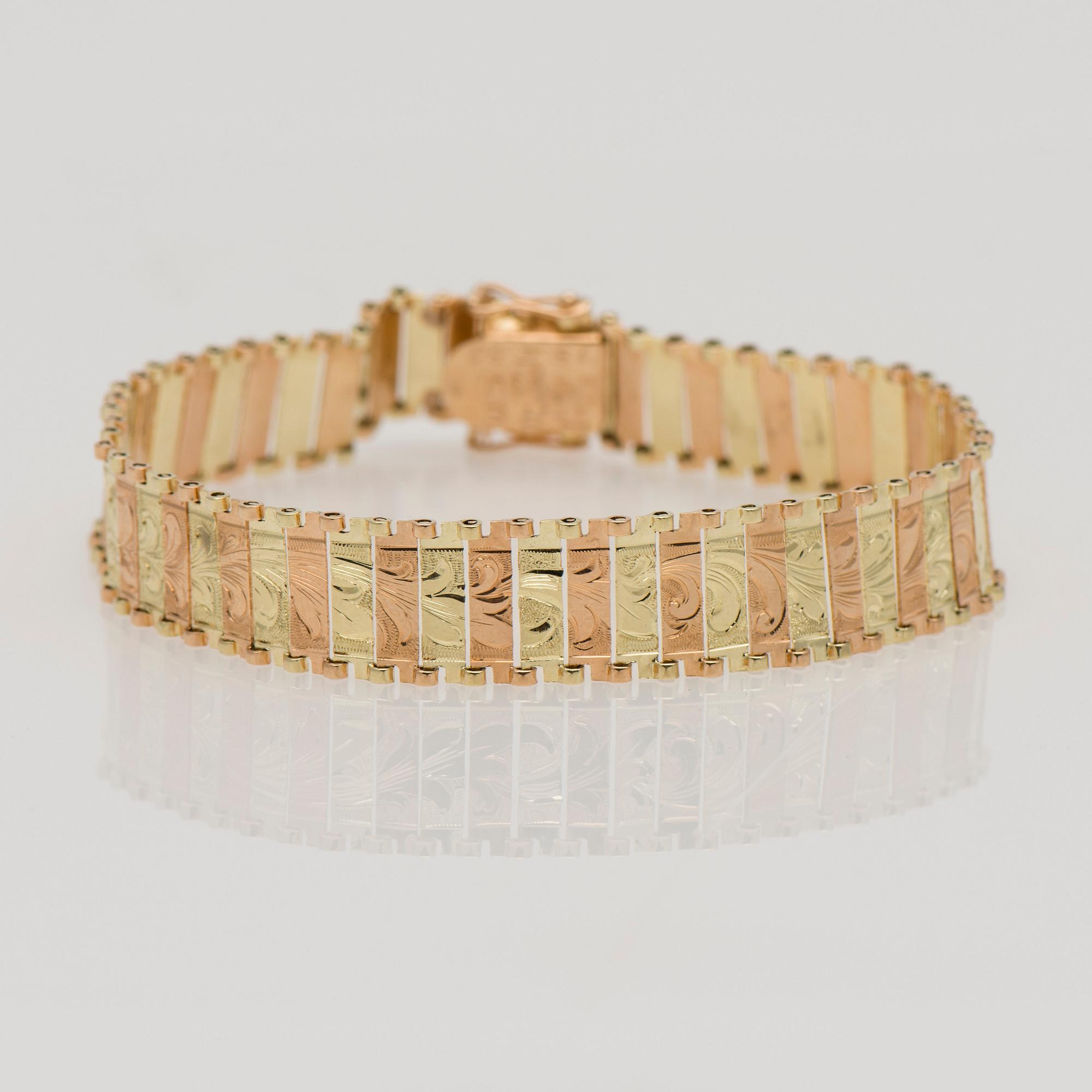 ARMBAND, 14K gult och rött guld. Finska stämplar Åbo 1960-tal. Vikt 16 g.