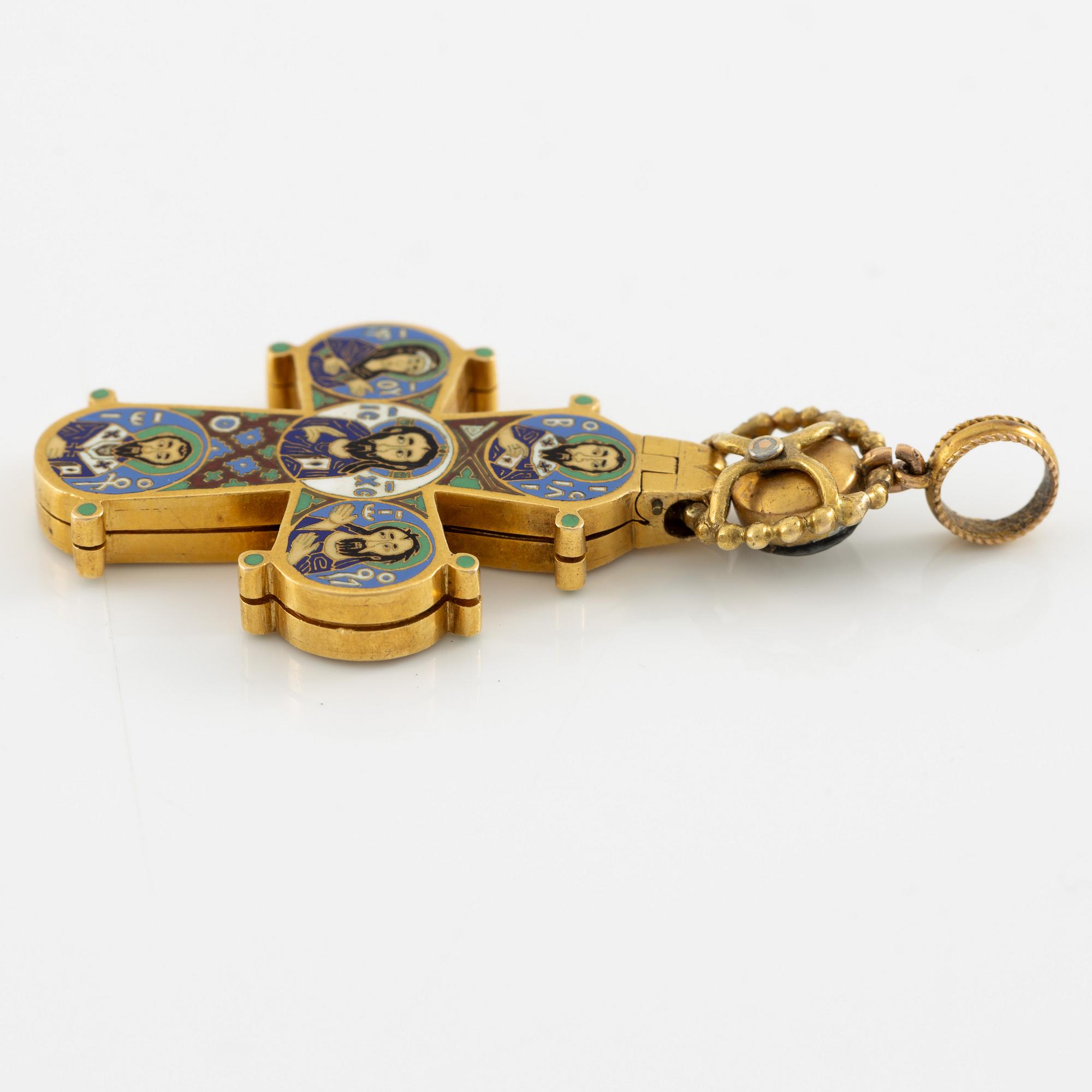 Cross 18K gold with enamel and white stone with relic compartment.