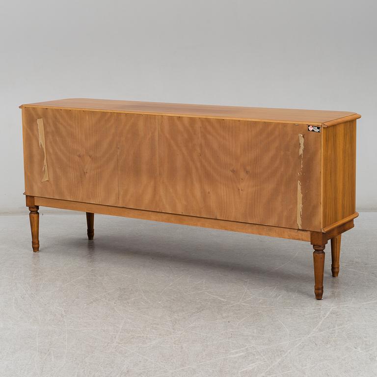 a gustavian style sideboard from the second half of the 20th century.