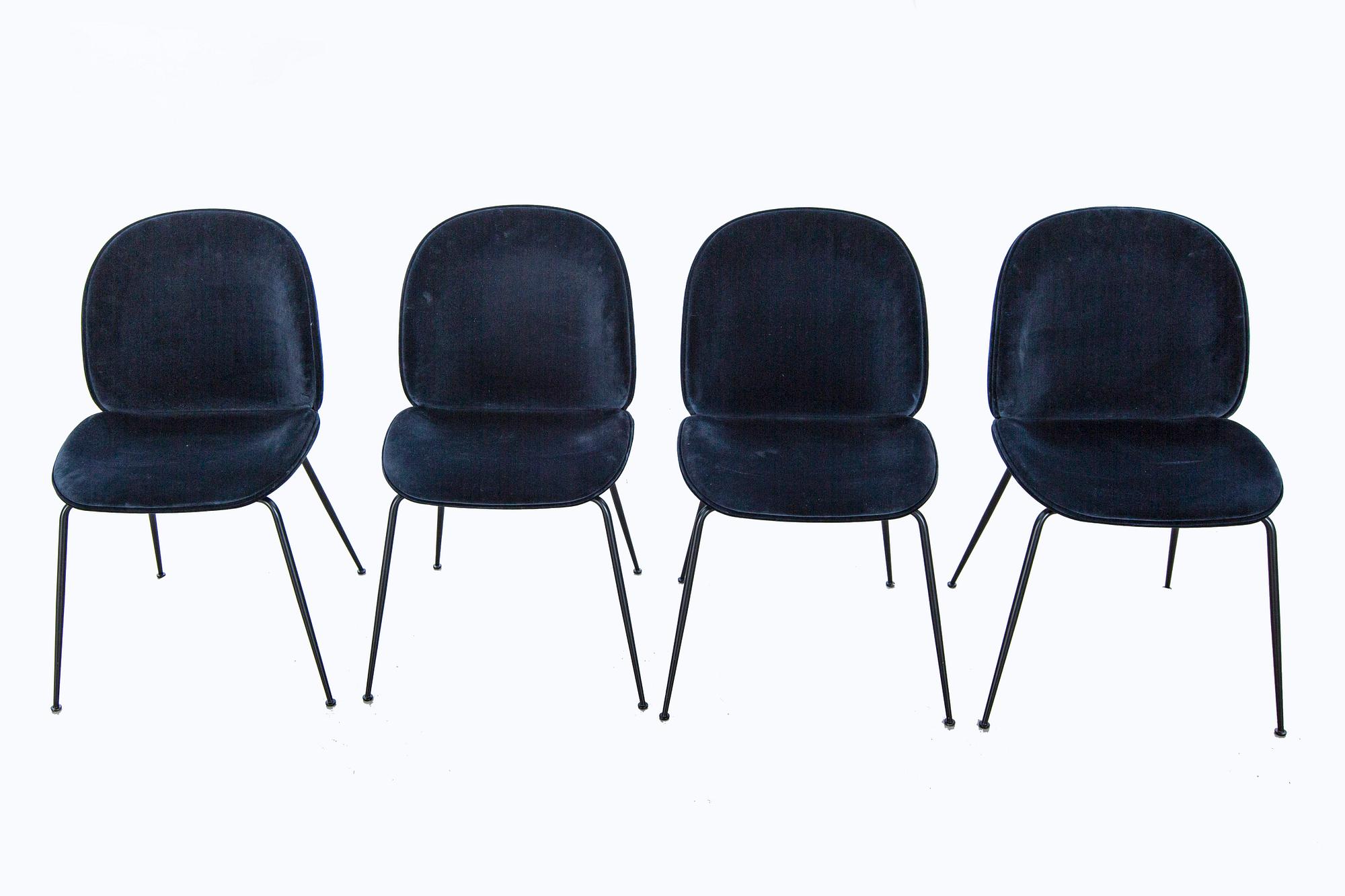 A set of four Beetle dining chairs by Gamfratesi for Gubi 2013.