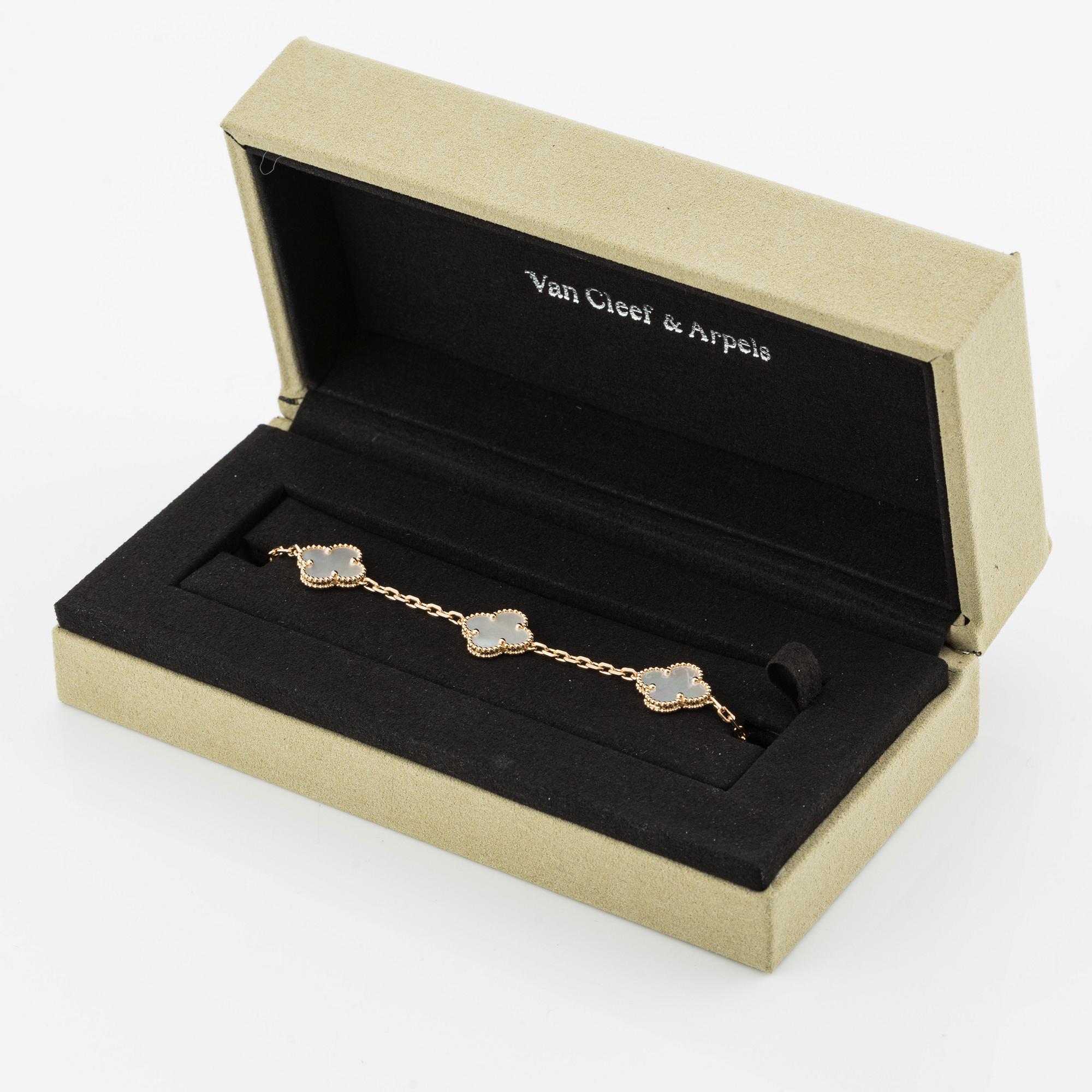An 18K gold and mother-of-pearl Van Cleef & Arpels "Alhambra" bracelet.