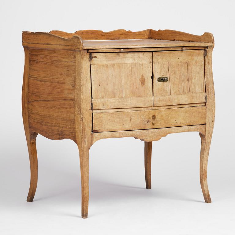 A Swedish rococo chamberpot cupboard, later part 18th century.