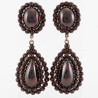 Örhängen förgyllt silver med granater.